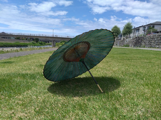 Japanese parasol, double layered, navy blue background with floral arabesque pattern